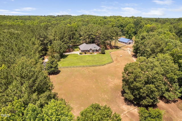 108 Cedarwood Dr, Louisburg, NC 27549 - aerial view of property and surrounding area featuring a heavily wooded area