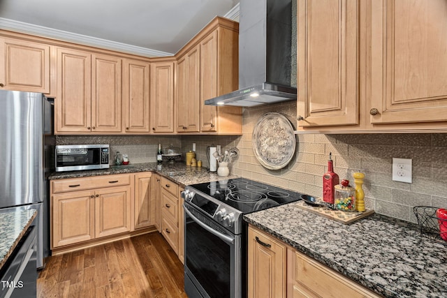 108 Cedarwood Dr, Louisburg, NC 27549 - kitchen with wall chimney range hood, stainless steel appliances, dark wood-style flooring, and dark stone counters