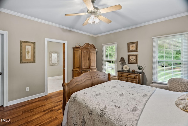 108 Cedarwood Dr, Louisburg, NC 27549 - bedroom featuring ornamental molding, dark wood finished floors, baseboards, and a ceiling fan