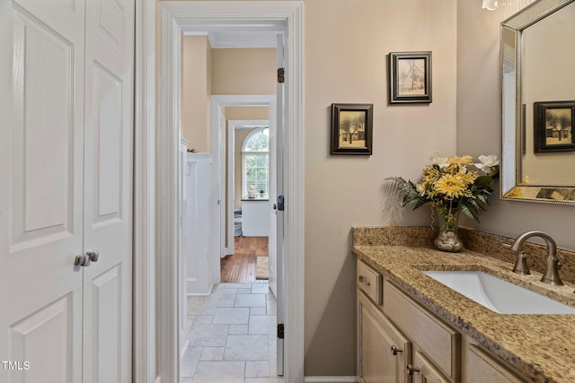 108 Cedarwood Dr, Louisburg, NC 27549 - bathroom featuring stone tile floors, vanity, and baseboards