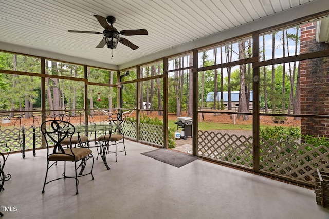 108 Cedarwood Dr, Louisburg, NC 27549 - sunroom / solarium with a ceiling fan and outdoor dining area