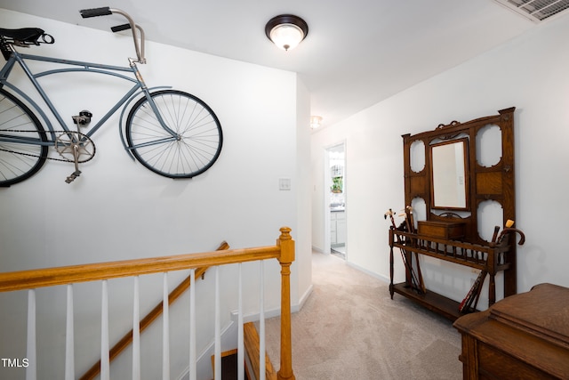 1166 NC Highway 87 N, Pittsboro, NC 27312 - hall with visible vents, an upstairs landing, and light carpet