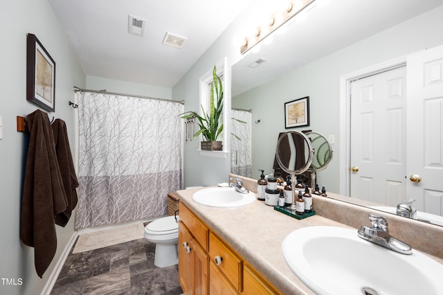 1166 NC Highway 87 N, Pittsboro, NC 27312 - bathroom featuring a sink, toilet, double vanity, and visible vents