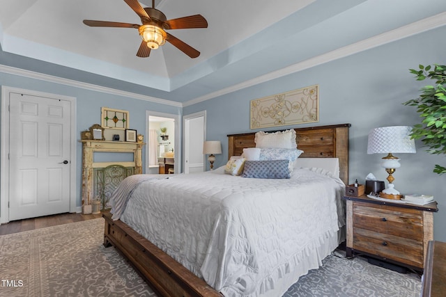 170 Homestead Rd, Angier, NC 27501 - bedroom featuring a tray ceiling, ceiling fan, and wood finished floors