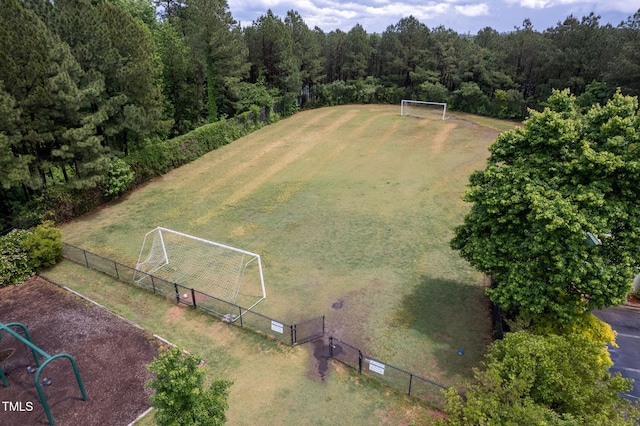 bird's eye view with a rural view and a wooded view