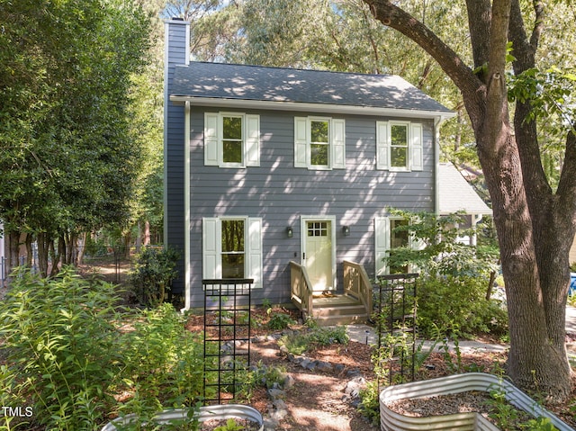 1605 Valley Run, Durham, NC 27707 - colonial-style house featuring a chimney and a shingled roof