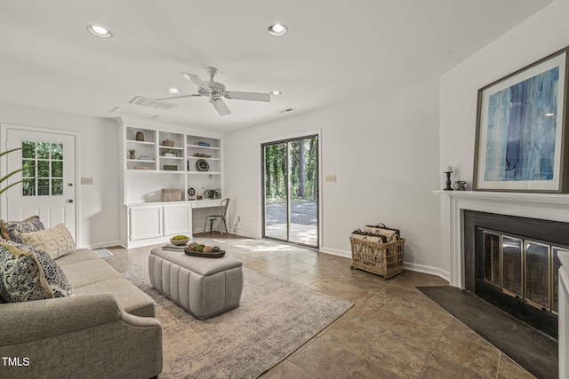 1605 Valley Run, Durham, NC 27707 - living area featuring plenty of natural light, a ceiling fan, recessed lighting, a fireplace with flush hearth, and baseboards