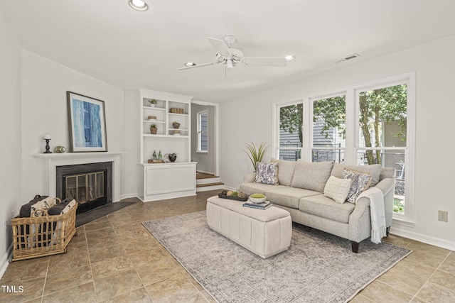 1605 Valley Run, Durham, NC 27707 - living room with baseboards, a fireplace with flush hearth, ceiling fan, and recessed lighting