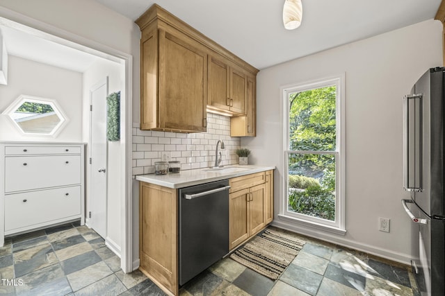 1605 Valley Run, Durham, NC 27707 - kitchen with stainless steel appliances, a sink, light countertops, baseboards, and stone finish flooring
