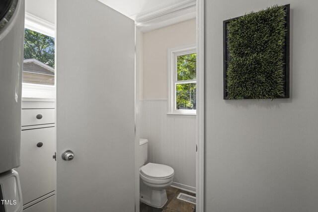 1605 Valley Run, Durham, NC 27707 - bathroom featuring wainscoting, toilet, and plenty of natural light