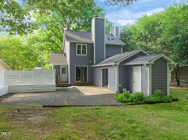 1605 Valley Run, Durham, NC 27707 - rear view of property featuring a patio, a chimney, a shingled roof, and entry steps