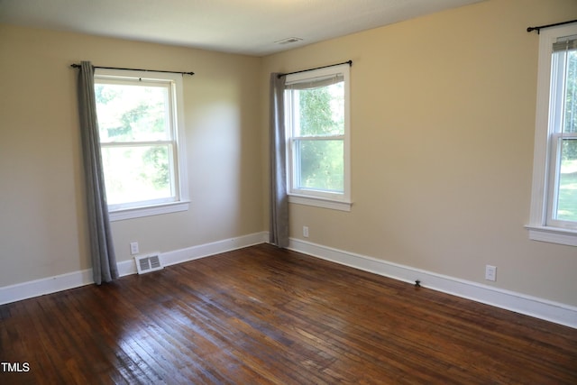 1927 Simpkins Rd, Raleigh, NC 27603 - unfurnished room featuring dark wood-style flooring and baseboards