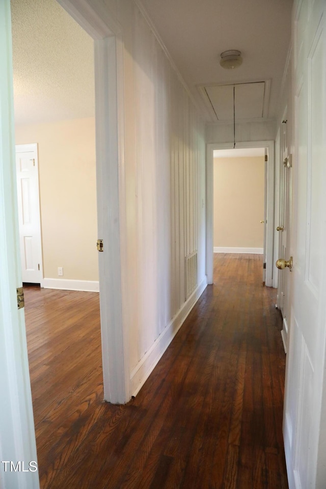 1927 Simpkins Rd, Raleigh, NC 27603 - hall featuring attic access and dark wood-type flooring