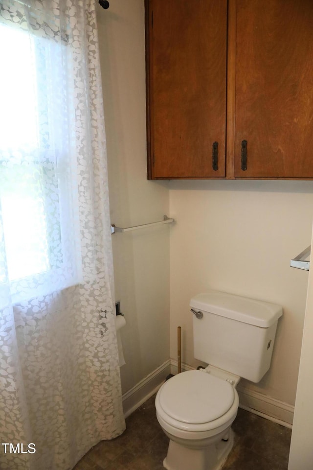 1927 Simpkins Rd, Raleigh, NC 27603 - bathroom featuring plenty of natural light and curtained shower