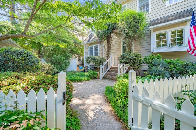 doorway to property featuring fence