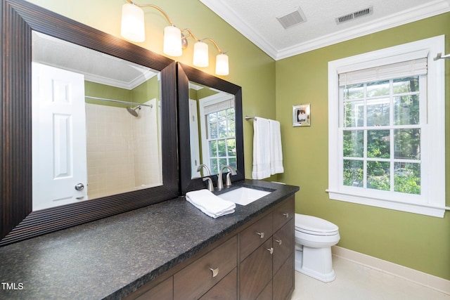 bathroom featuring crown molding, vanity, toilet, baseboards, and visible vents