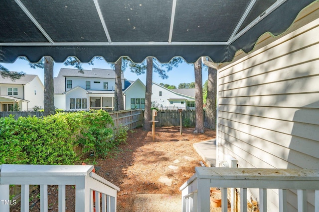 view of yard with a residential view and a fenced backyard