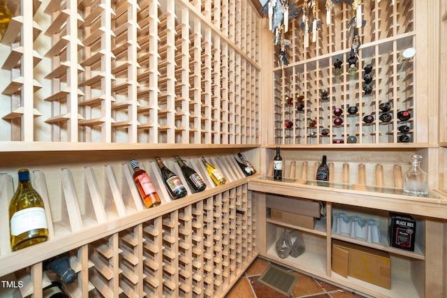 wine room with visible vents and tile patterned floors