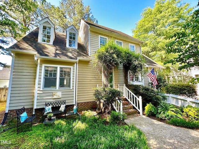 view of front of home with fence