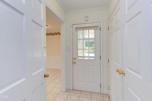 doorway to outside featuring light tile patterned flooring, baseboards, and ornamental molding