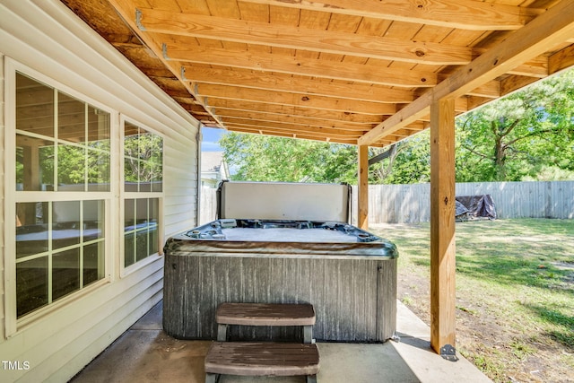 105 N 11th St, Erwin, NC 28339 - view of patio featuring fence and a hot tub