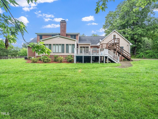 12823 Summerwind Trl, Rougemont, NC 27572 - rear view of house with a deck, stairway, a chimney, roof with shingles, and brick siding