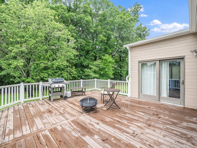 12823 Summerwind Trl, Rougemont, NC 27572 - wooden deck featuring a fire pit and area for grilling