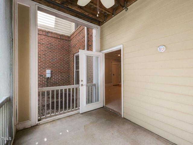 doorway to property with a patio area