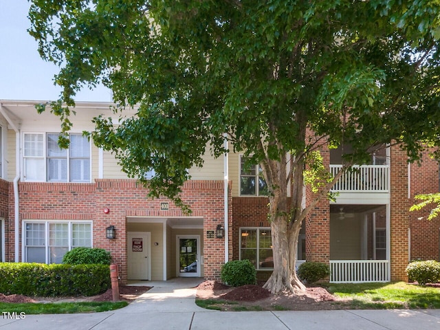 view of front of home with brick siding