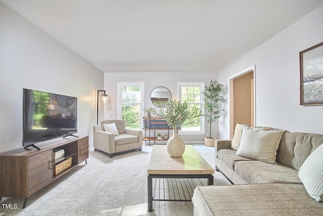 living room featuring light carpet
