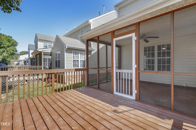 wooden terrace with a sunroom