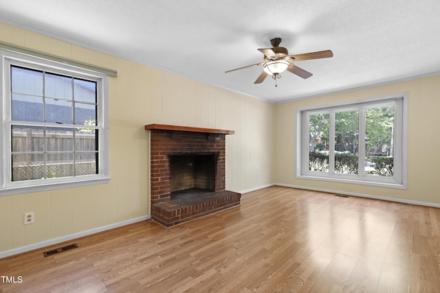 101 Atchison St, Garner, NC 27529 - unfurnished living room featuring baseboards, ceiling fan, visible vents, and wood finished floors