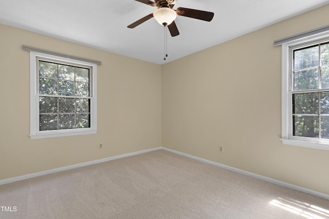 101 Atchison St, Garner, NC 27529 - carpeted spare room with baseboards and a ceiling fan