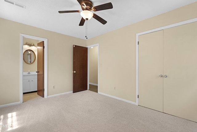 101 Atchison St, Garner, NC 27529 - unfurnished bedroom with carpet flooring, a sink, baseboards, ensuite bathroom, and visible vents