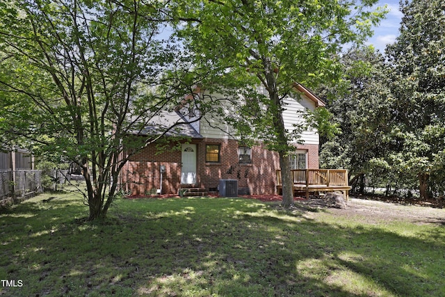 101 Atchison St, Garner, NC 27529 - view of yard featuring a deck, central AC, fence, and entry steps