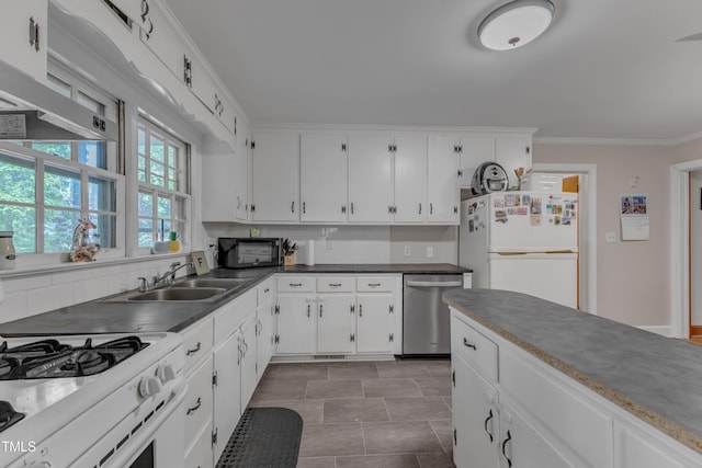 kitchen with backsplash, crown molding, a sink, white cabinets, and white appliances