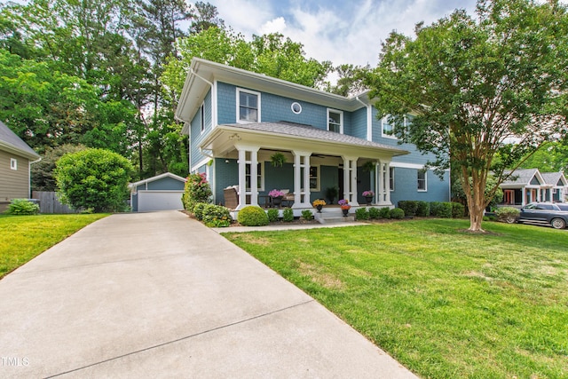 2517 Medway Dr, Raleigh, NC 27608 - traditional style home with a detached garage, covered porch, an outdoor structure, and a front yard