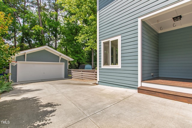 2517 Medway Dr, Raleigh, NC 27608 - view of home's exterior with an outdoor structure and a garage
