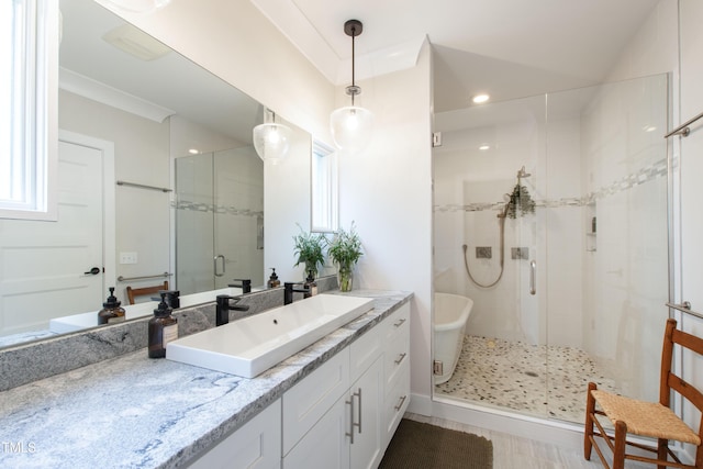 2517 Medway Dr, Raleigh, NC 27608 - full bathroom featuring recessed lighting, a shower stall, a soaking tub, and vanity