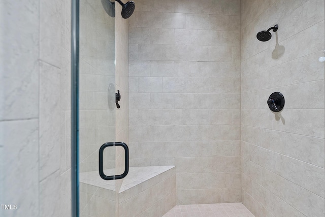 full bath with a shower stall