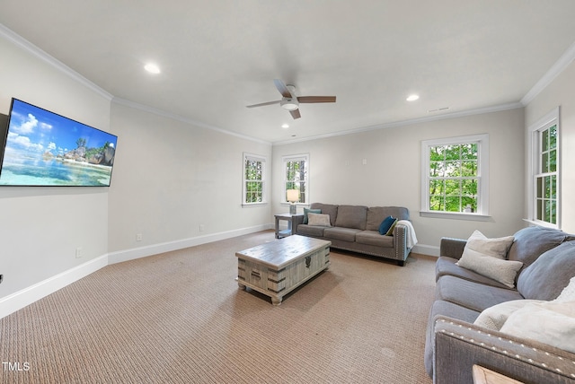 living area with baseboards, ornamental molding, light carpet, a ceiling fan, and recessed lighting
