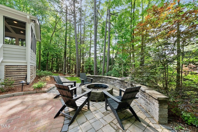 view of patio featuring an outdoor fire pit