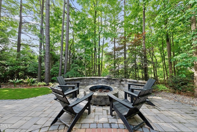 view of patio with an outdoor fire pit