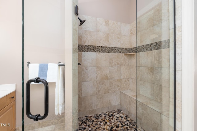 full bath featuring a shower stall and vanity