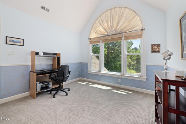 home office with visible vents, baseboards, carpet floors, and lofted ceiling