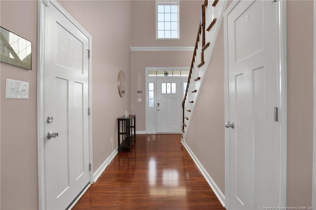 4258 Cherry Hill Ln, Fayetteville, NC 28312 - entryway featuring dark wood-style flooring, baseboards, plenty of natural light, and stairway