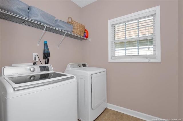 4258 Cherry Hill Ln, Fayetteville, NC 28312 - clothes washing area featuring laundry area, baseboards, and washing machine and dryer