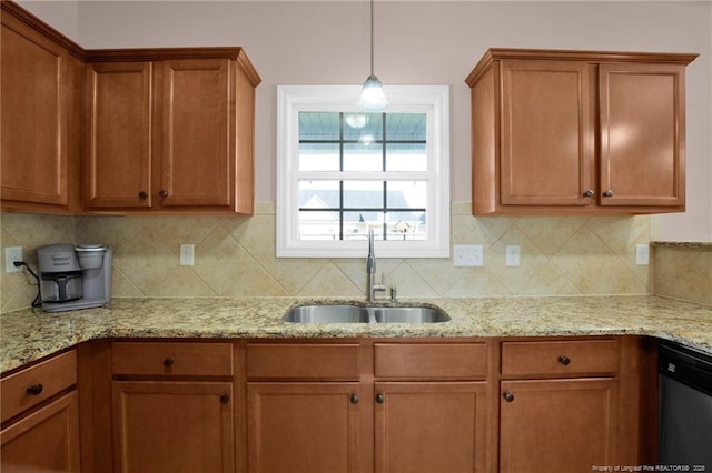 4258 Cherry Hill Ln, Fayetteville, NC 28312 - kitchen featuring a sink, decorative backsplash, brown cabinetry, and dishwashing machine