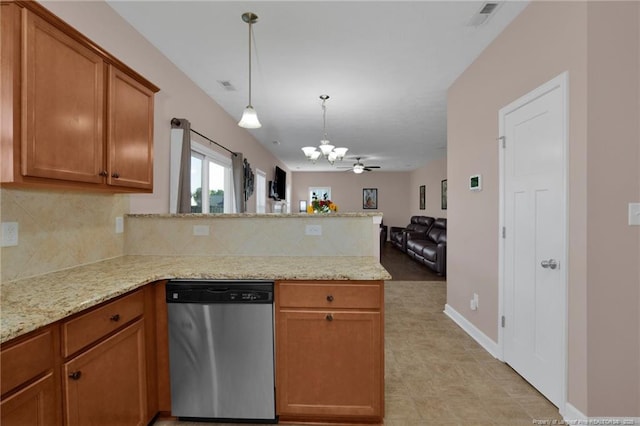 4258 Cherry Hill Ln, Fayetteville, NC 28312 - kitchen featuring brown cabinetry, tasteful backsplash, stainless steel dishwasher, a peninsula, and an inviting chandelier
