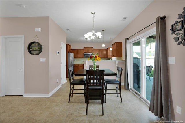 4258 Cherry Hill Ln, Fayetteville, NC 28312 - dining room featuring an inviting chandelier, baseboards, and visible vents